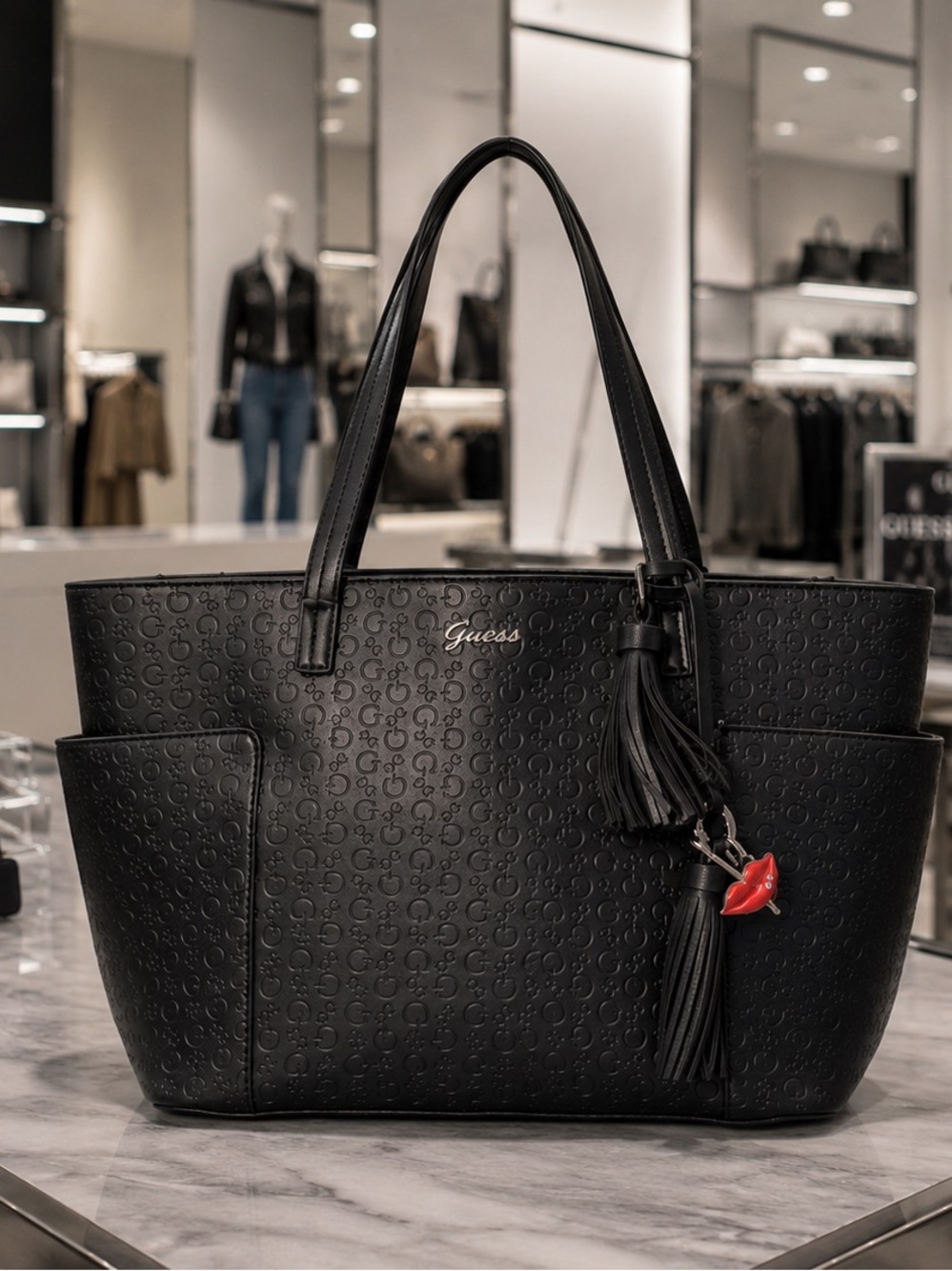 Guess Black Logo Embossed Tassel Tote Shoulder Bag w/ Lip Bag Charm